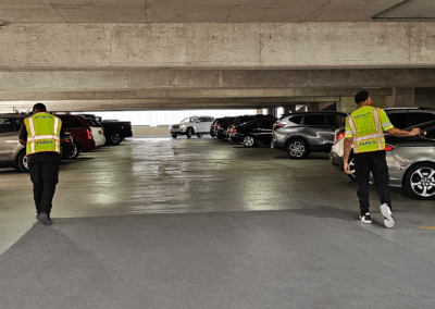 Security team inspecting parking garage for threats